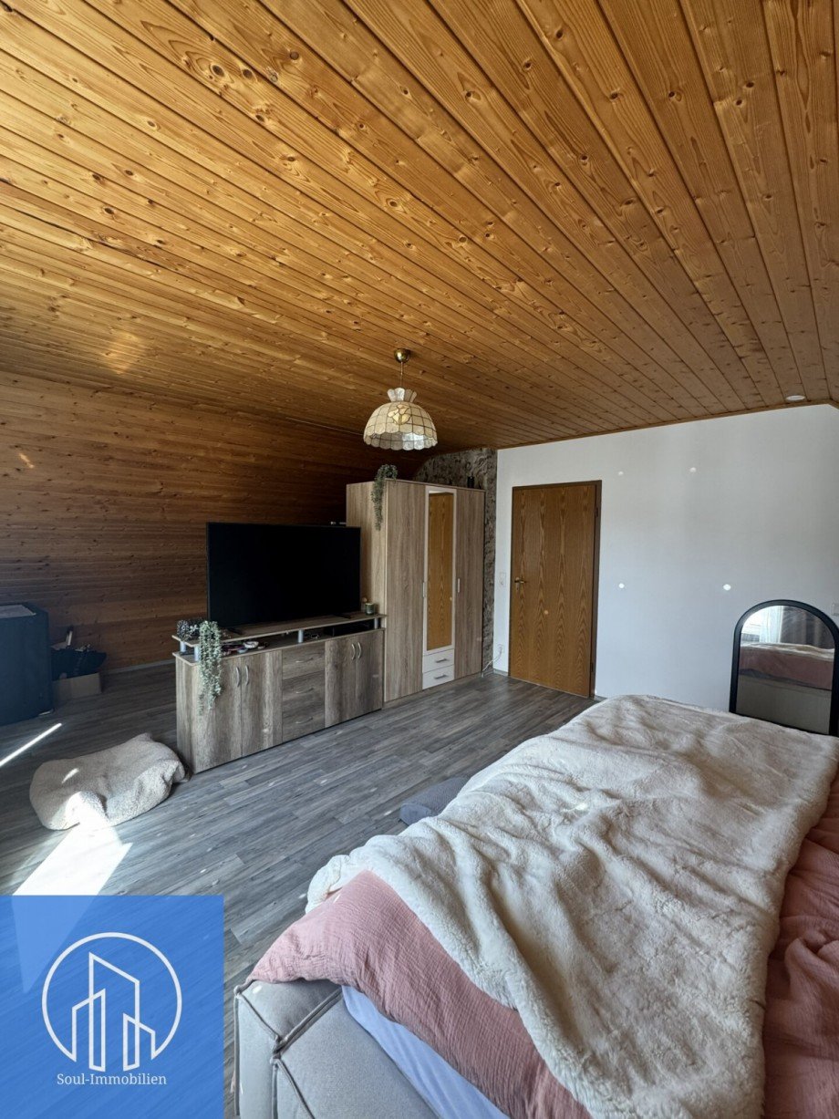 Schlafzimmer 1.1 Dachgeschosswohnung Zirndorf-Weinzierlein