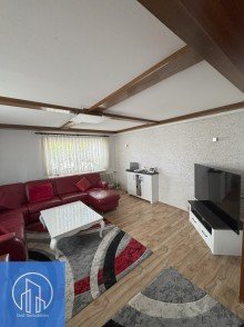 Wohnzimmer 1.1 von WO1+2 Top-Kapitalanlage: Mehrfamilienhaus mit 5 Wohneinheiten, alle vermietet.